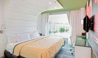 King room with comfortable bed and work desk at Wyndham Garden Brooklyn Sunset Park.