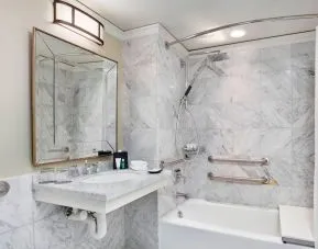Private guest bathroom with shower and tub at The Westin Philadelphia.