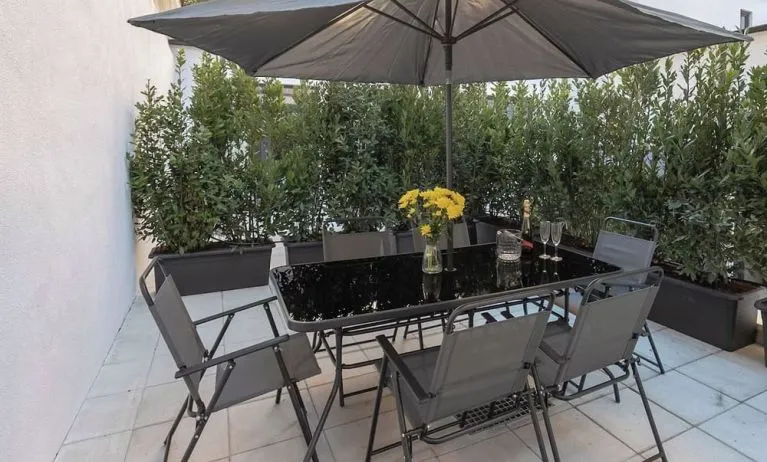 Outdoor terrace at Aiello Hotels - CityLife Apartments.