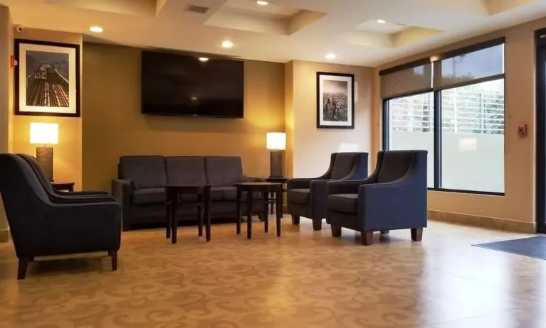Lobby lounge area at Days Inn By Wyndham Brooklyn Marine Park.