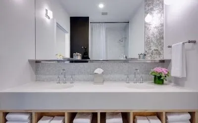Private guest bathroom with shower and free toiletries at Nu Hotel - Brooklyn.