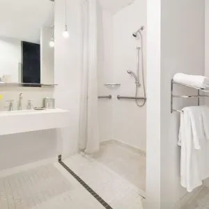 Private guest bathroom with shower at Nu Hotel - Brooklyn.