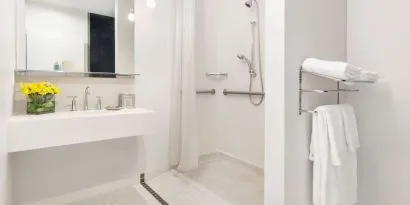 Private guest bathroom with shower at Nu Hotel - Brooklyn.