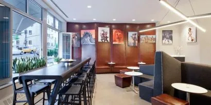 Lobby lounge area and workspace at Nu Hotel - Brooklyn.
