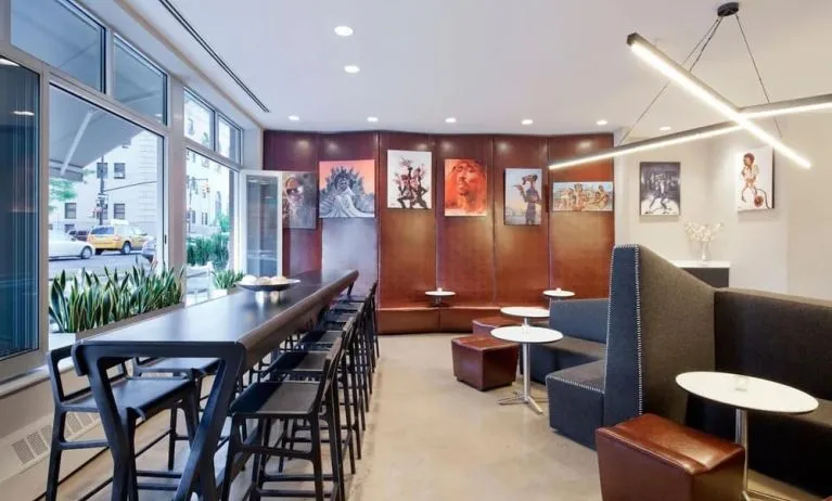Lobby lounge area and workspace at Nu Hotel - Brooklyn.