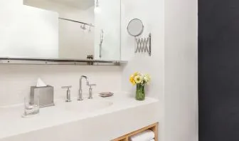 Private guest bathroom with shower and free toiletries at Nu Hotel - Brooklyn.