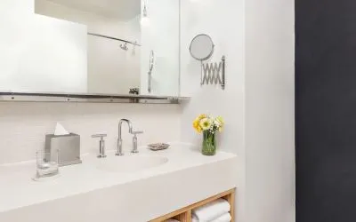 Private guest bathroom with shower and free toiletries at Nu Hotel - Brooklyn.