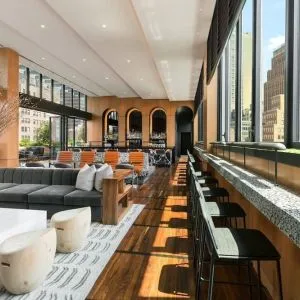 Lounge area with comfortable seating, perfect for coworking at AC Hotel New York Times Square.