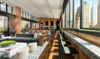 Lounge area with comfortable seating, perfect for coworking at AC Hotel New York Times Square.