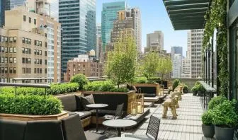 Beautiful terrace with comfortable seating at AC Hotel New York Times Square.
