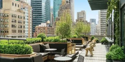 Beautiful terrace with comfortable seating at AC Hotel New York Times Square.