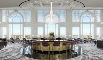 Hotel bar and lounge area with natural light at The Westin New Orleans.