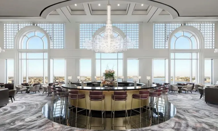 Hotel bar and lounge area with natural light at The Westin New Orleans.