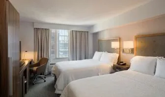 Day use twin room with work desk, large windows and private bathroom at Hampton Inn Manhattan Chelsea.