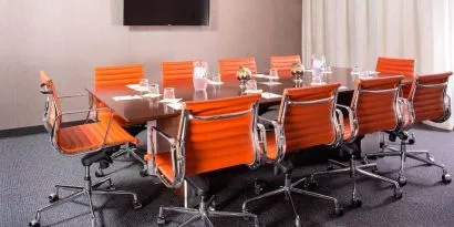 Professional meeting room with comfortable seating at Courtyard By Marriott New York Manhattan/Central Park.
