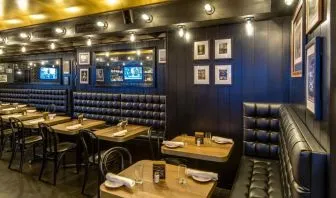 On-site restaurant with comfortable seating, perfect for coworking at Hotel Shocard NYC.