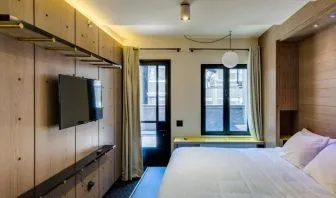 King room with large windows, work desk and private bathroom at Hotel Shocard NYC.