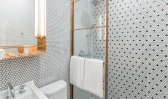 Private guest bathroom with shower at Hotel Shocard NYC.