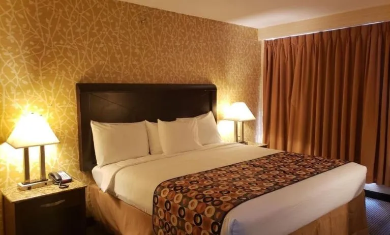 King bed at Elmhurst Hotel.