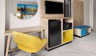 Day use rooms include work desk, mini-bar, TV screen and microwave at Days Inn By Wyndham Staten Island.