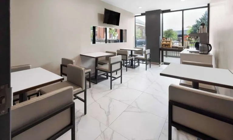 Dining area with comfortable seating, perfect for co-working at Days Inn By Wyndham Staten Island.