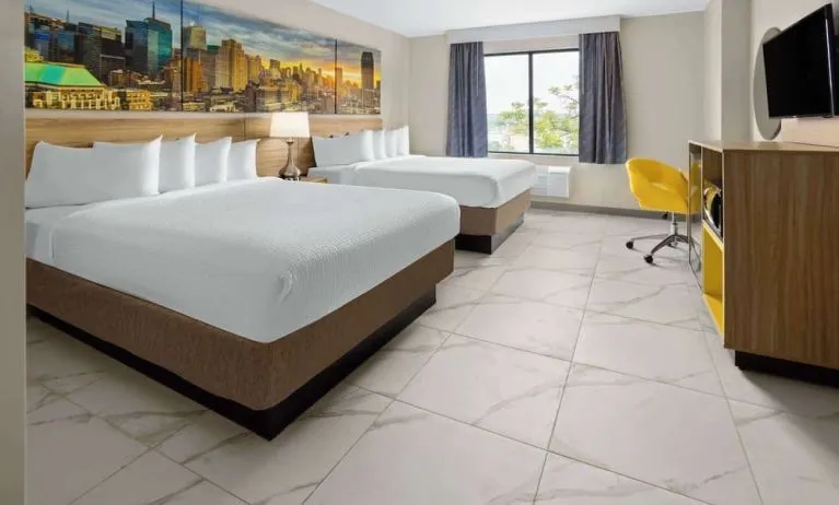 Day use twin room with work desk and private bathroom at Days Inn By Wyndham Staten Island.