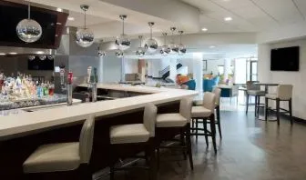 On-site bar with lounge area at Sheraton Miami Airport Hotel.