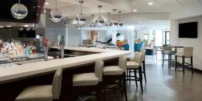 On-site bar with lounge area at Sheraton Miami Airport Hotel.