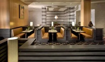 Dining area with comfortable seating, perfect for co-working at EB Hotel Miami.