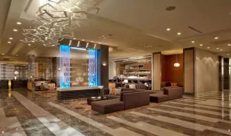 Hotel lobby with lounge seating at EB Hotel Miami. 