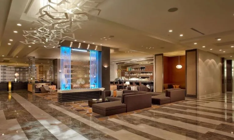 Hotel lobby with lounge seating at EB Hotel Miami. 