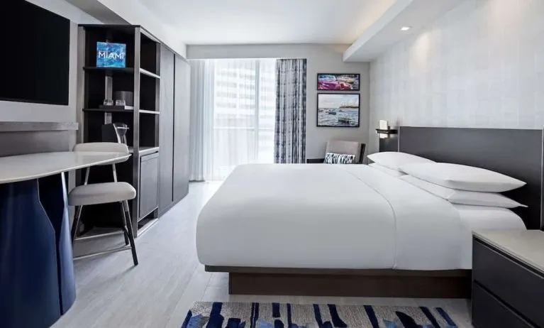Day use room king bed with work desk and private bathroom at Hyatt Centric Brickell Miami.