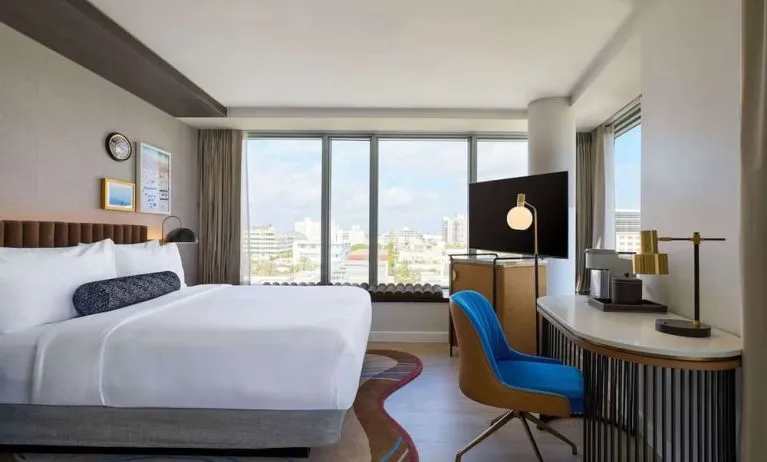 Day use room with king bed, work desk and private bathroom at Hyatt Centric Miami South Beach.