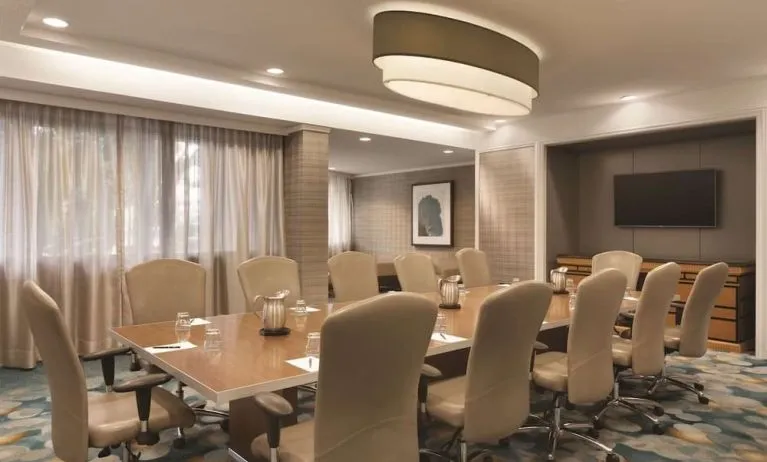 Professional meeting room with comfortable seating at Hilton Miami Airport Blue Lagoon.