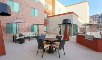 Outdoor terrace seating at Hampton Inn & Suites Denver Tech Center.