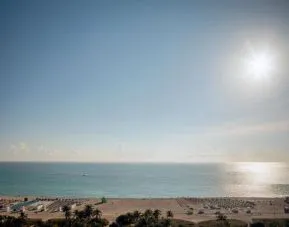 Private beach access with lounge area at Shelborne South Beach.