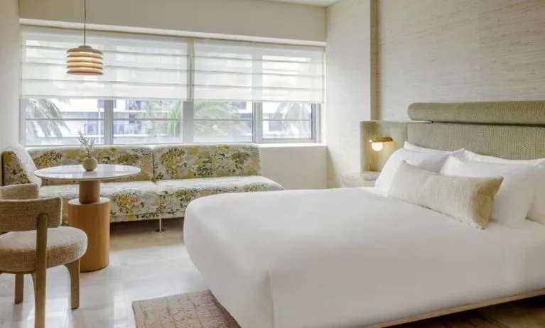 Day use room with lounge and workspace area and private bathroom at Shelborne South Beach.