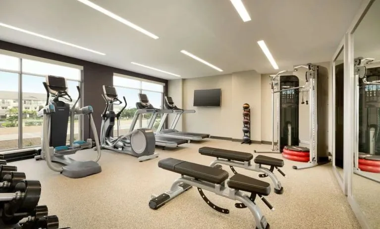 Fitness center at Embassy Suites By Hilton Oahu Kapolei.
