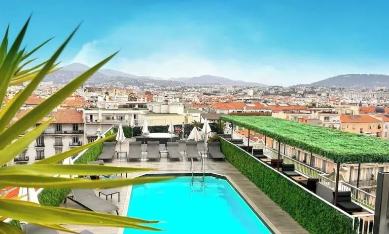Refreshing outdoor pool with an incomparable view at Splendid Hotel & Spa Nice.