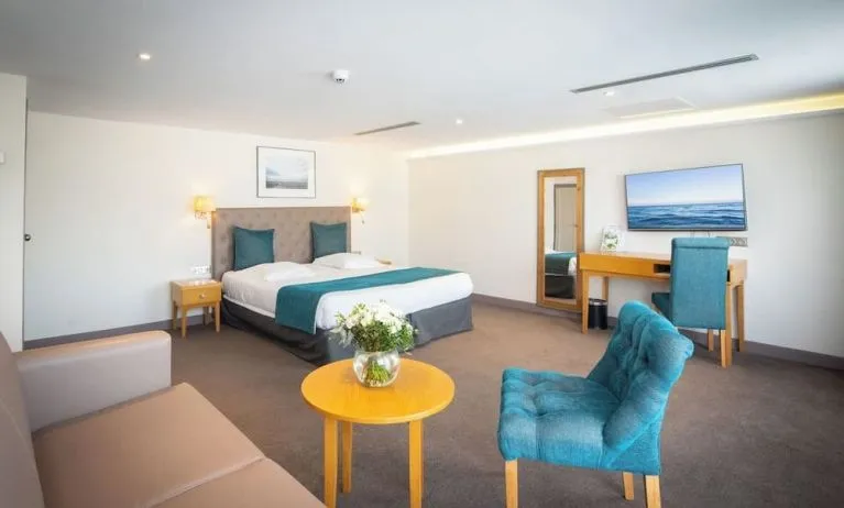 Spacious day use room with sofa at Splendid Hotel & Spa Nice.
