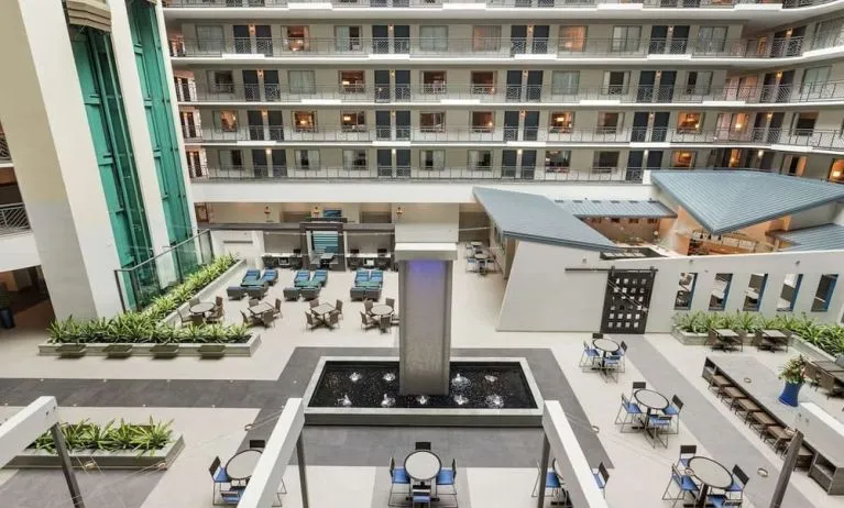 Dining area, workspace and lounge at Embassy Suites By Hilton Miami - International Airport.