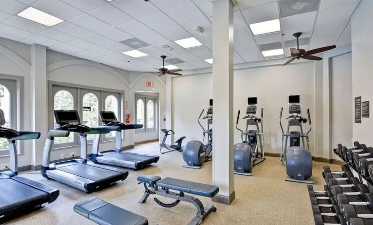 Fully equipped fitness center at Embassy Suites By Hilton Miami - International Airport.