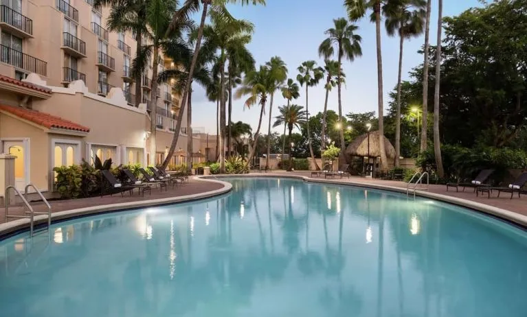 Outdoor pool at Embassy Suites By Hilton Miami - International Airport.