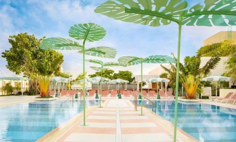 Beautiful outdoor pool with lounge chairs at The Goodtime Hotel.