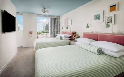 Day use twin room with lounge chairs and private bathroom at The Goodtime Hotel.