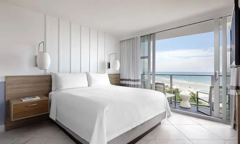 King room with balcony and private bathroom at Cadillac Hotel & Beach Club, Autograph Collection.