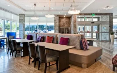 Coworking space and lounge at Home2 Suites By Hilton San Francisco Airport North.