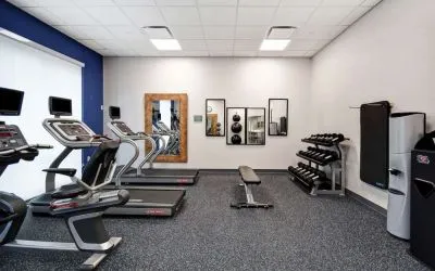 Gym at Home2 Suites By Hilton San Francisco Airport North.