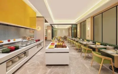 Dining area at Hilton Garden Inn Surat City Centre.