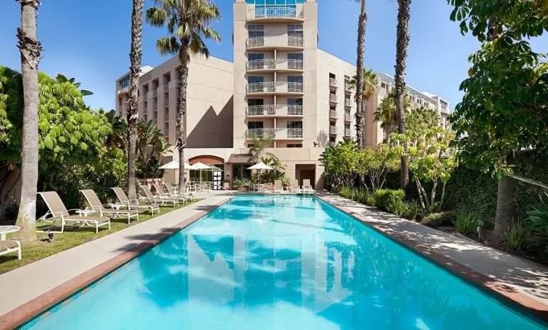 Refreshing outdoor pool at Embassy Suites By Hilton Brea North Orange County.